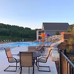 Double-Sided Fireplace, Lake Views, Daily Tickets To Local Attractions, Air Hockey!